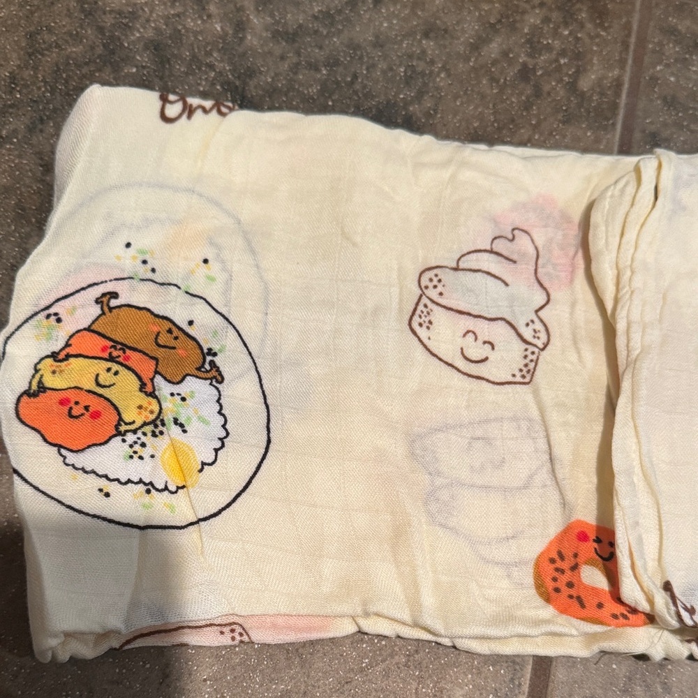 Coco Moon x Zippy’s collab swaddle - Cream and Orange - Picture 3 of 5